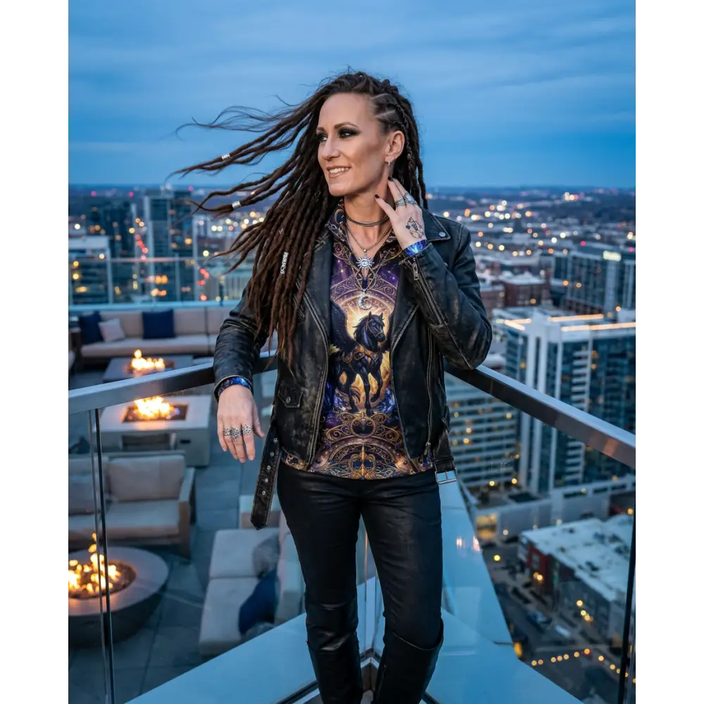 Black leather jacket with studded details and distressed texture shown from the back for equestrian use