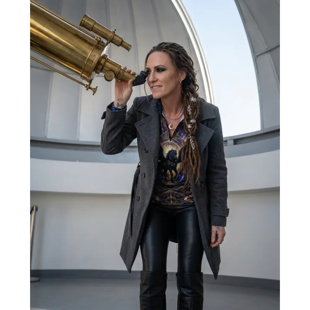 Brass telescope with ornate detailing featuring a classic optical design for the astral ascension sun shirt upf50+ collection