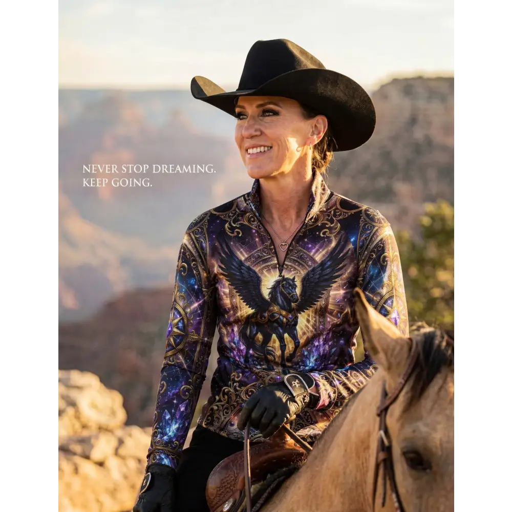 A vibrant long-sleeved performance equestrian sun shirt with cosmic eagle and horse design on purple and gold galaxy background
