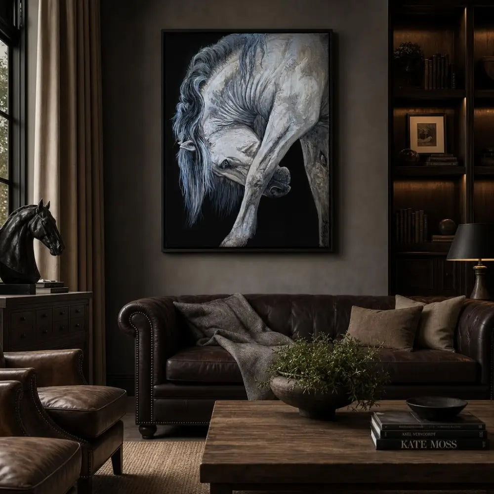 A black and white canvas print of a flowing white horse with detailed musculature framed in dark wood by Nadine Ewing