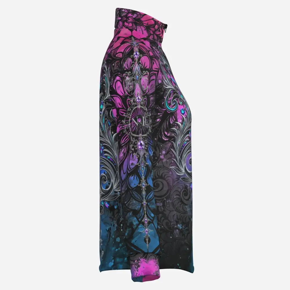 A high-necked long-sleeved performance equestrian sun shirt in magenta and teal with black floral patterns upf50+