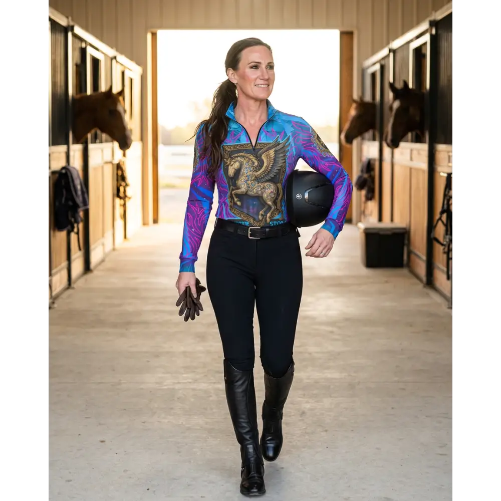 Vibrant long-sleeved performance equestrian sun shirt with golden winged horse design and blue purple gradients upf 50+