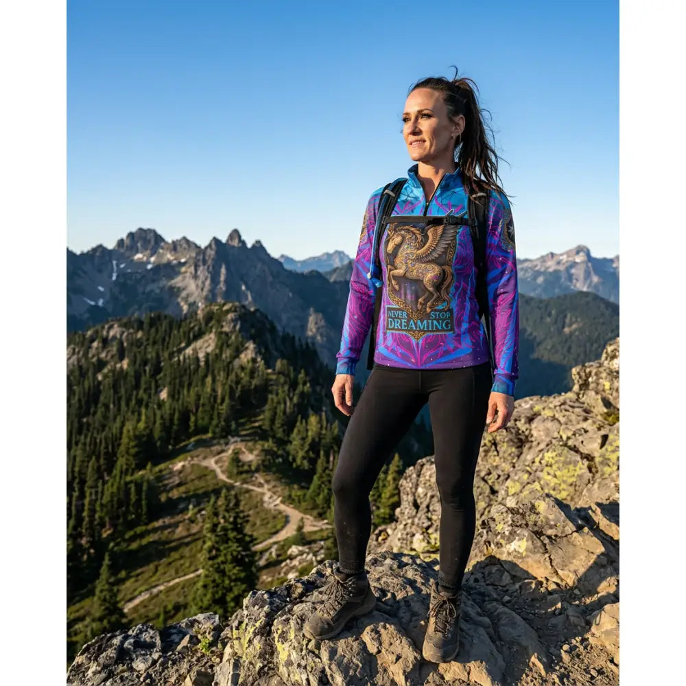 Vibrant purple and blue long-sleeved performance equestrian sun shirt with golden griffin and stop dreaming text