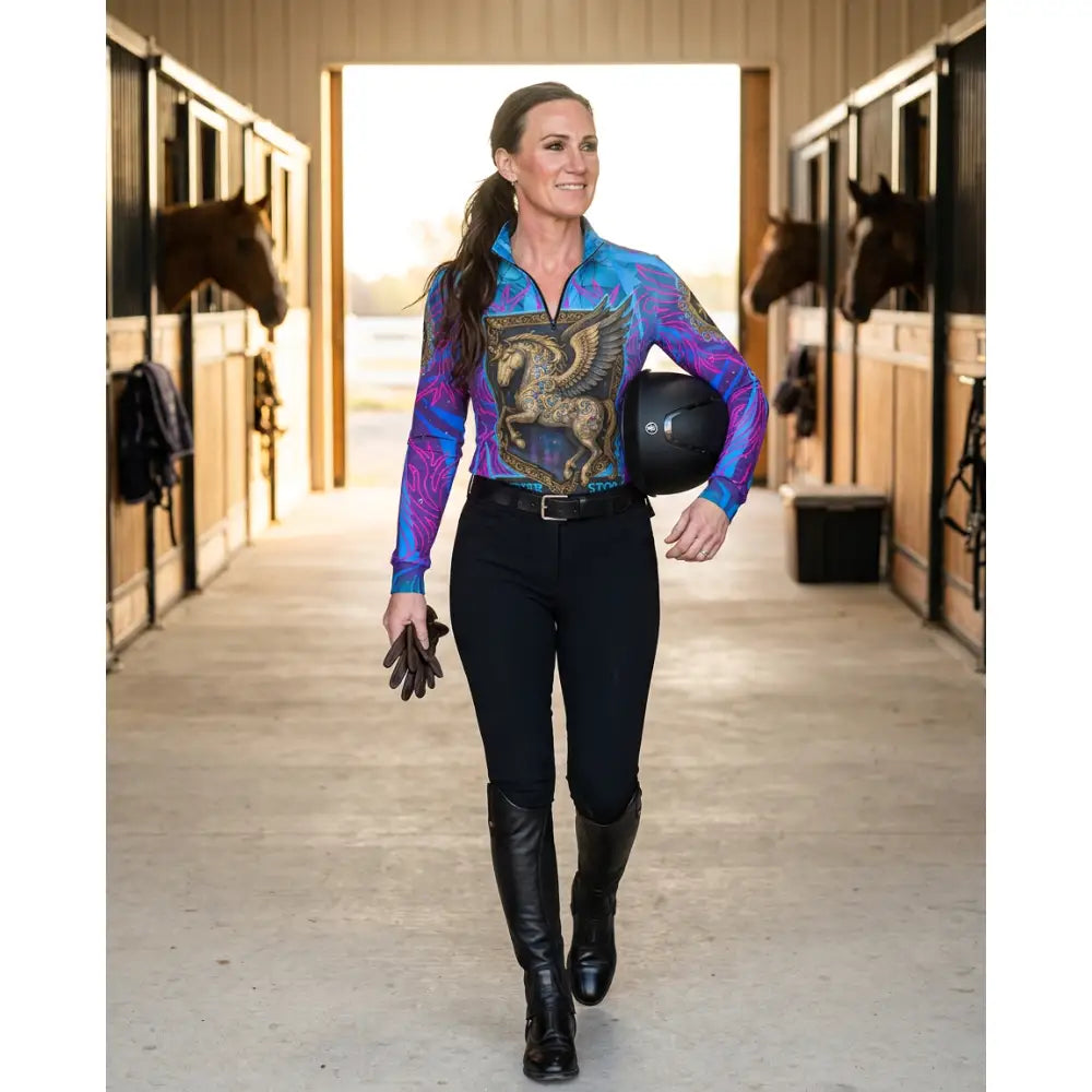 Vibrant long-sleeved performance equestrian sun shirt with golden winged horse design and blue purple gradients stop dreaming