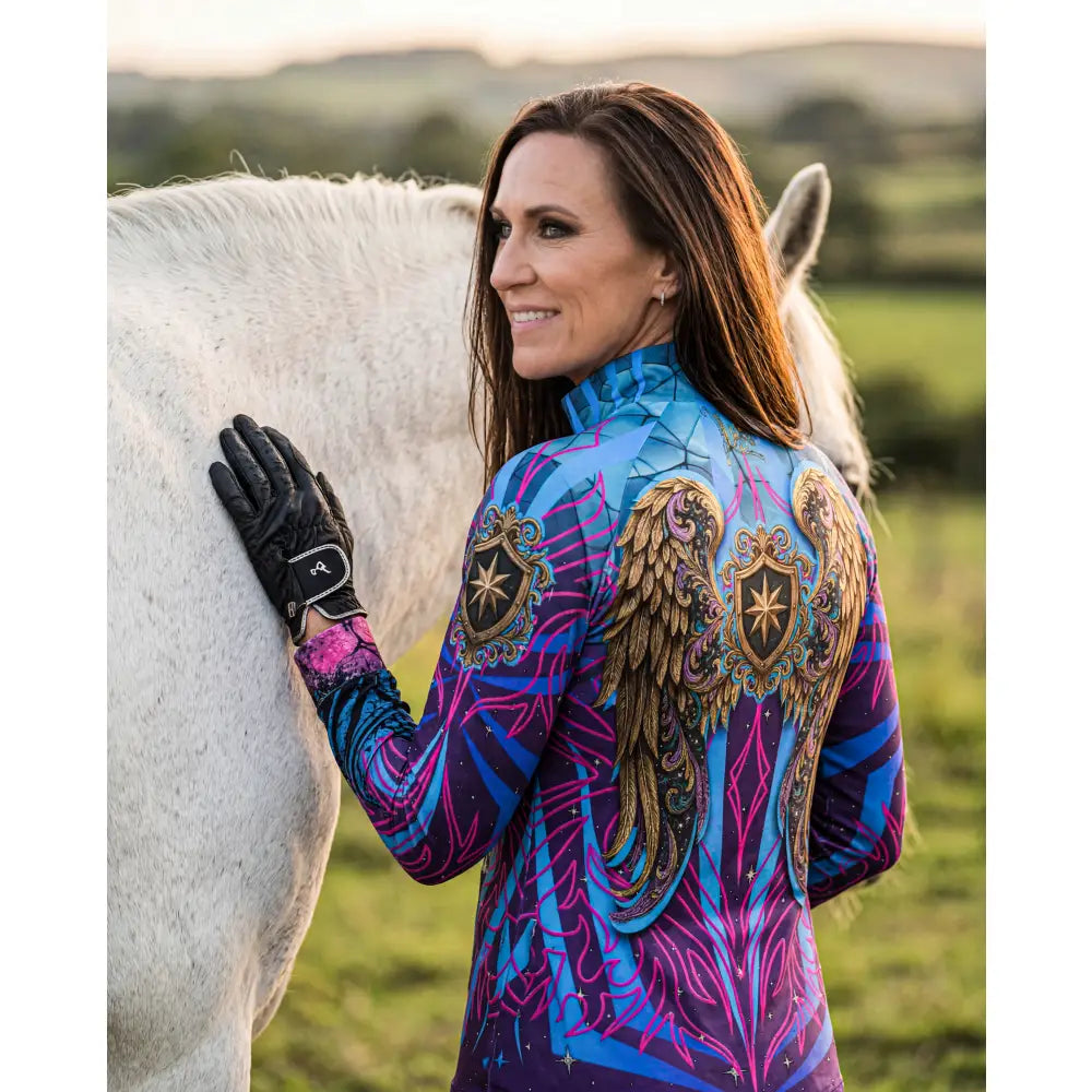 Electric blue and magenta performance equestrian sun shirt with winged horse print and stop dreaming design details