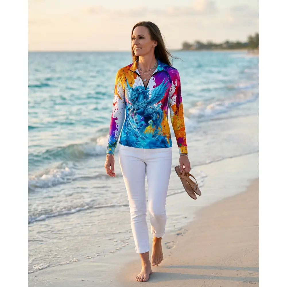 A vibrant riptide radiance equestrian sun shirt with blue and purple pegasus design from the ripley signature collection