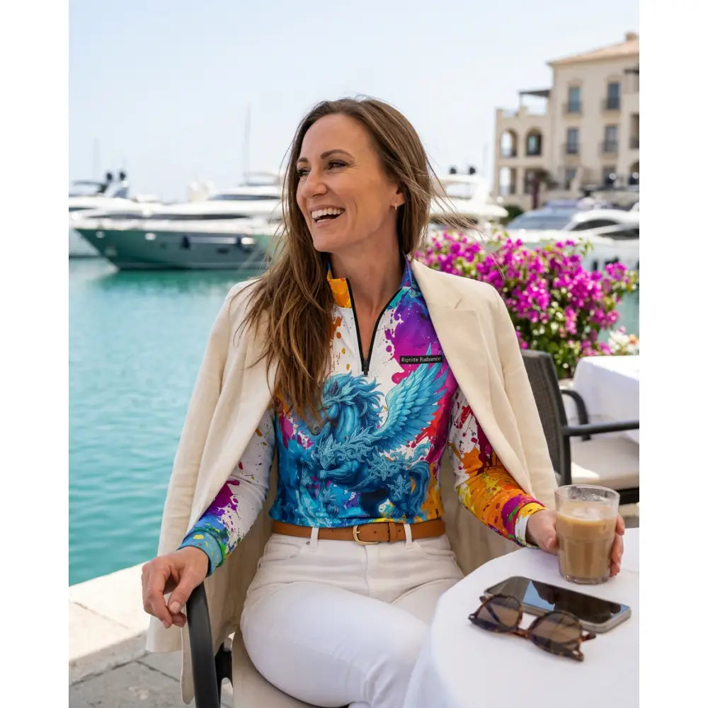 Vibrant blue and multicolored winged creature print blouse from riptide radiance ripley signature collection wearable art