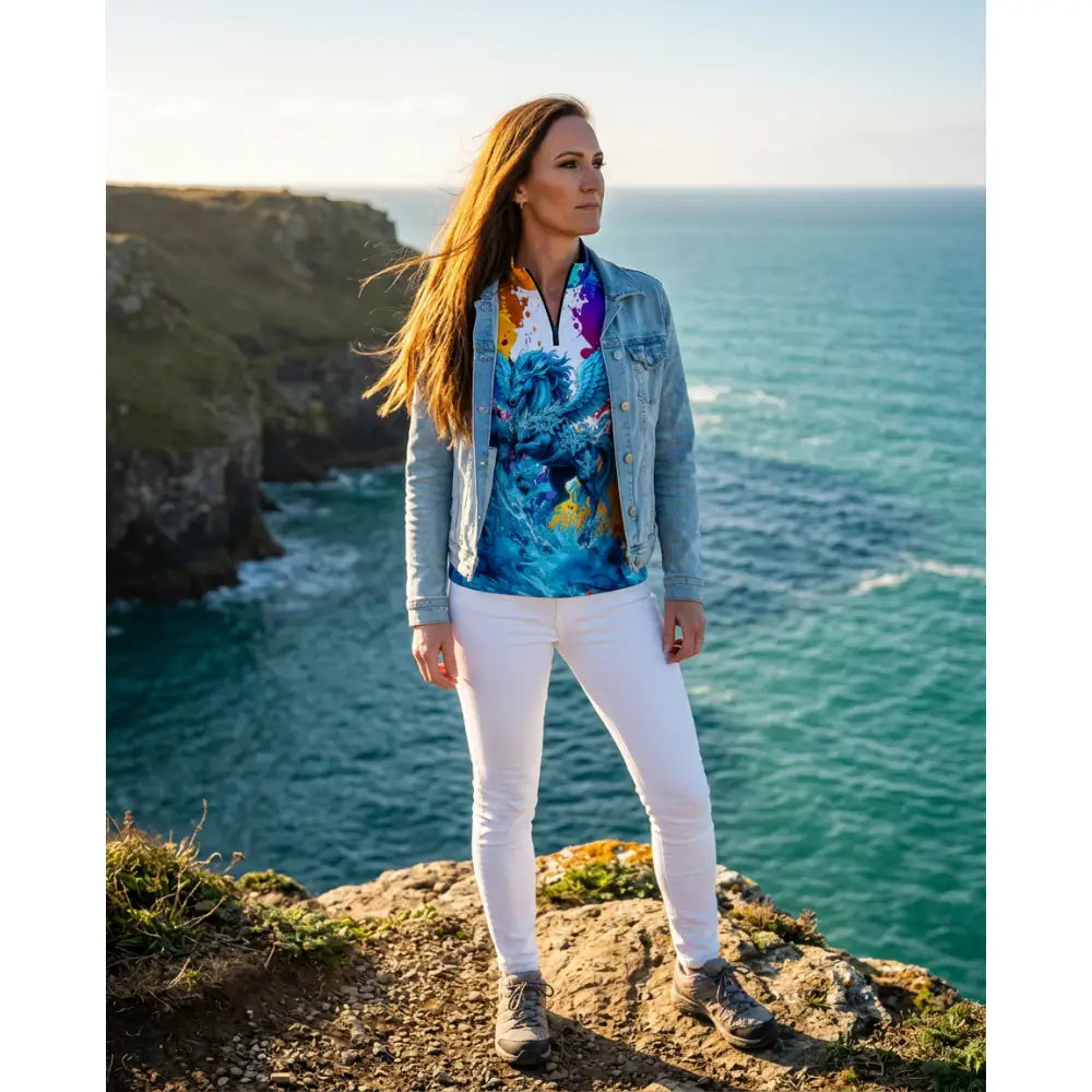 Woman wearing riptide radiance pegasus ocean print equestrian sun shirt from ripley signature collection in vibrant blue