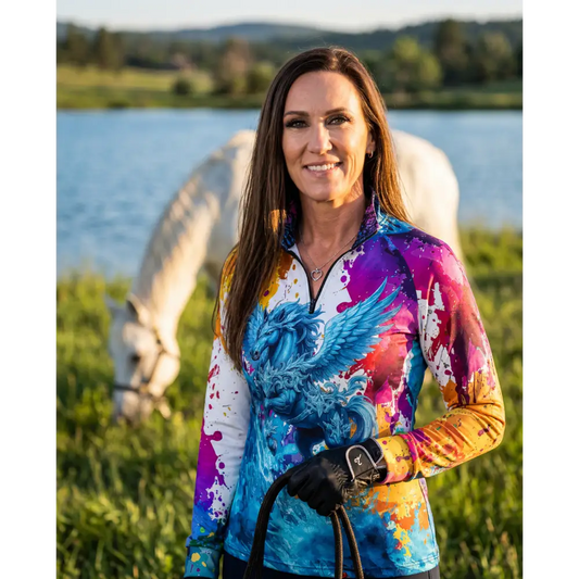 Vibrant long-sleeved riptide radiance equestrian sun shirt with blue phoenix and colorful paint splatter design upf50+