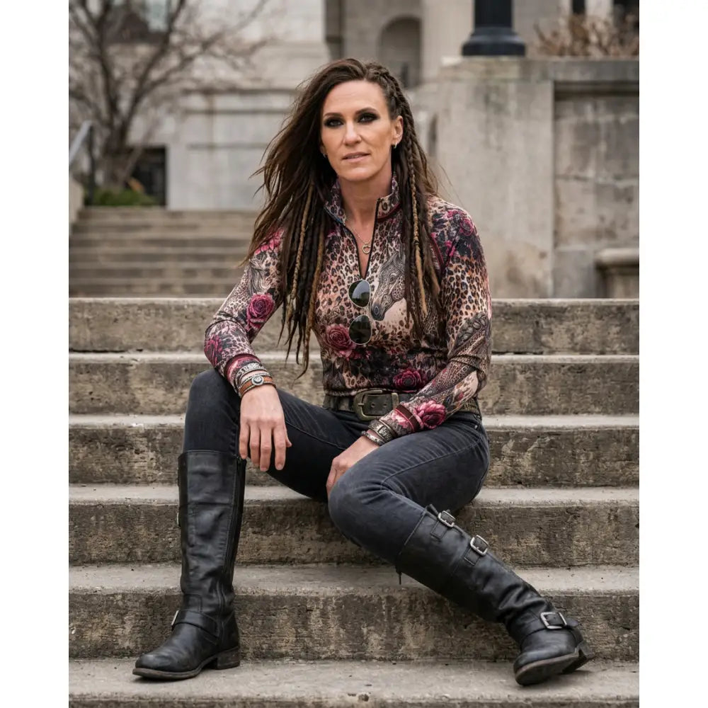 Black leather knee-high boots with silver buckles paired with rosae equiferus equestrian sun shirt by karen reinertson