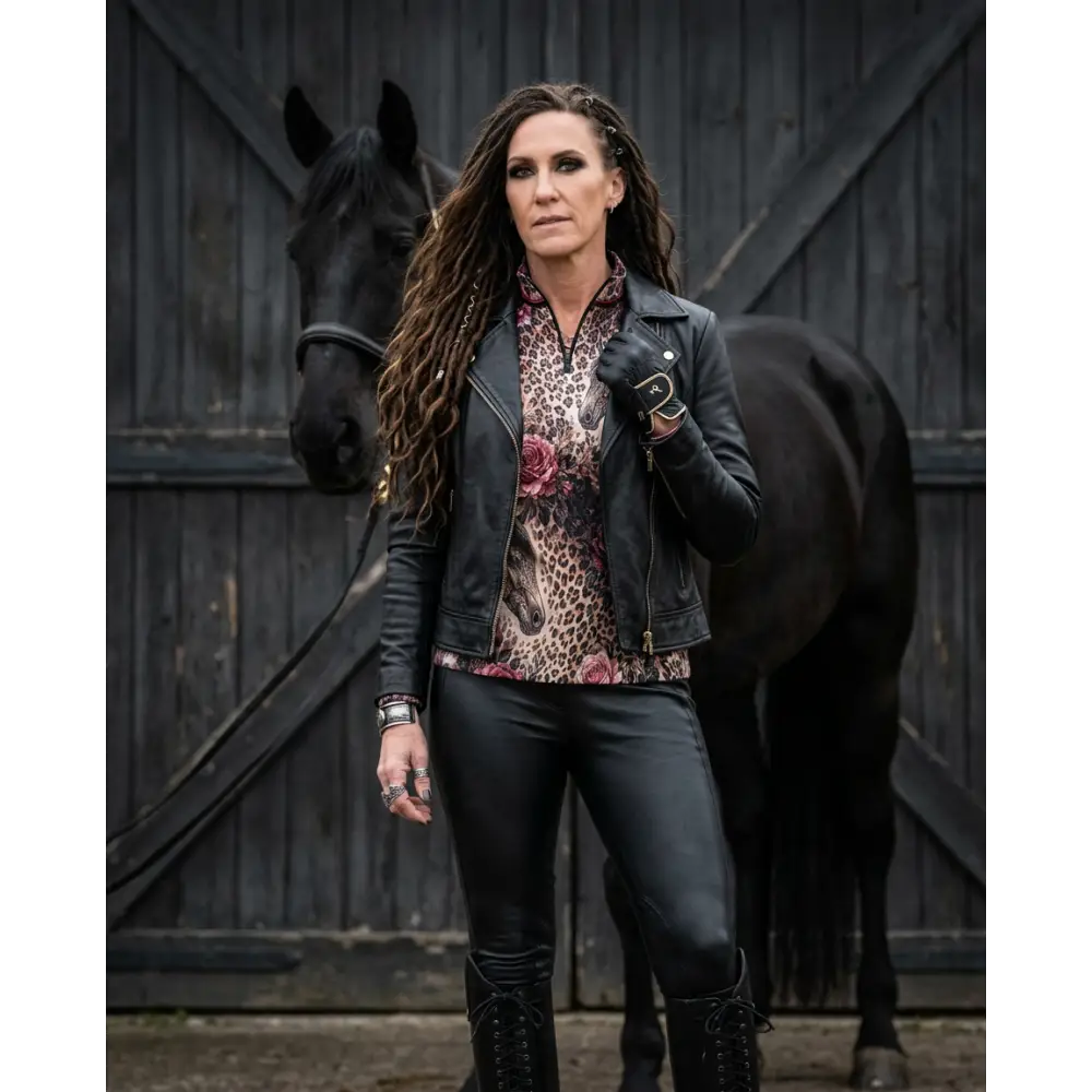 Black leather biker jacket with zipper closure and snap buttons shown from the back in the rosae equiferus upf50+ equestrian sun shirt collection