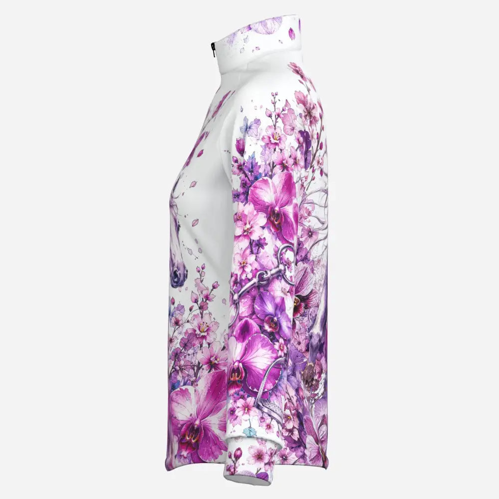A white long-sleeved equestrian sun shirt with vibrant purple and pink orchid floral pattern and upf50 plus protection