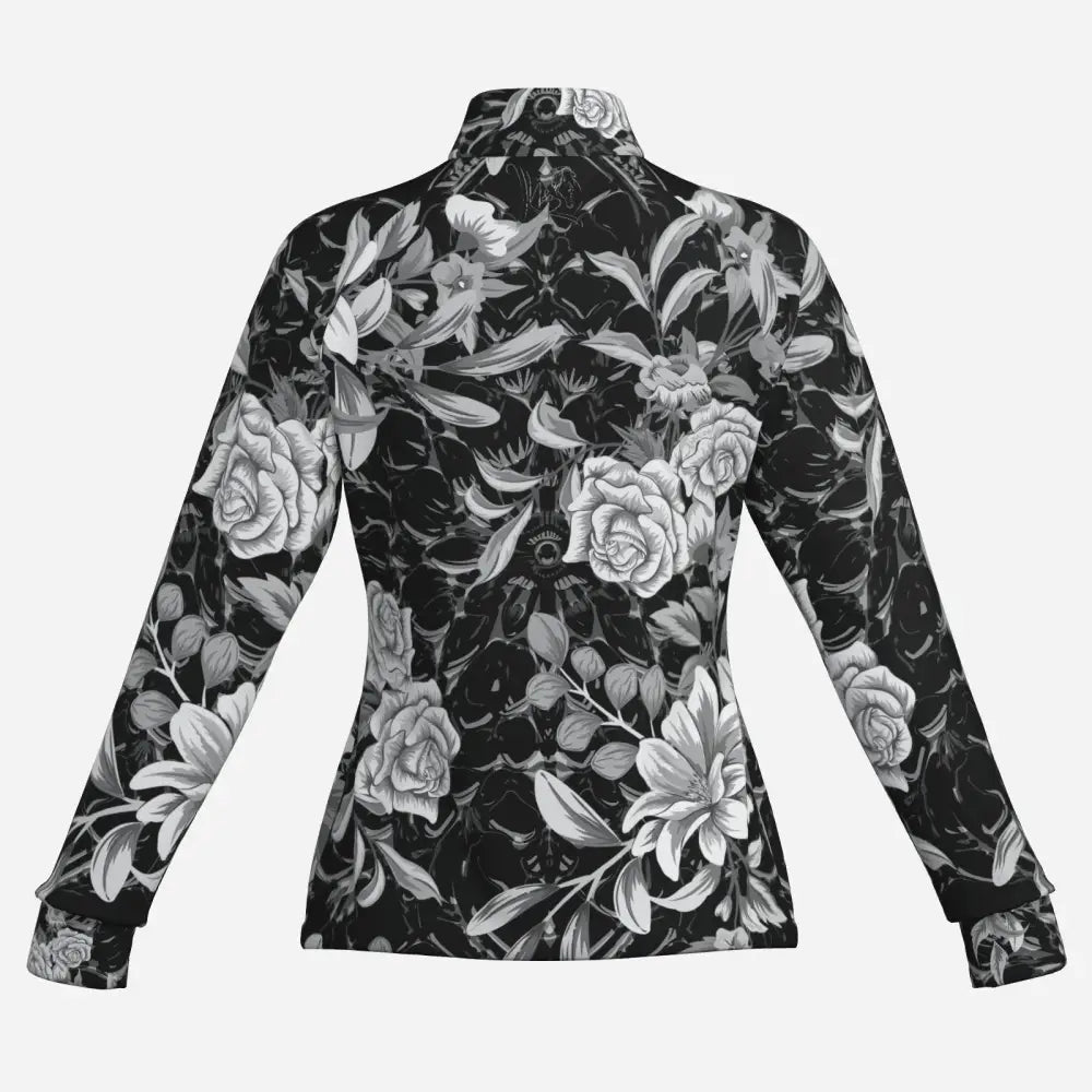 Black long-sleeved shadow bloom performance blouse with high collar and intricate monochrome floral cooling fabric