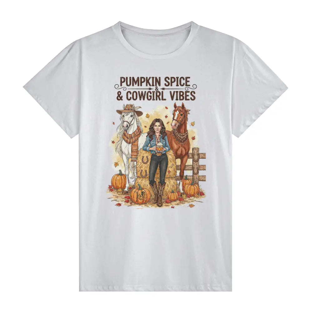 White unisex cotton T-shirt with pumpkin spice and cowgirl vibes featuring woman horses pumpkins autumn leaves
