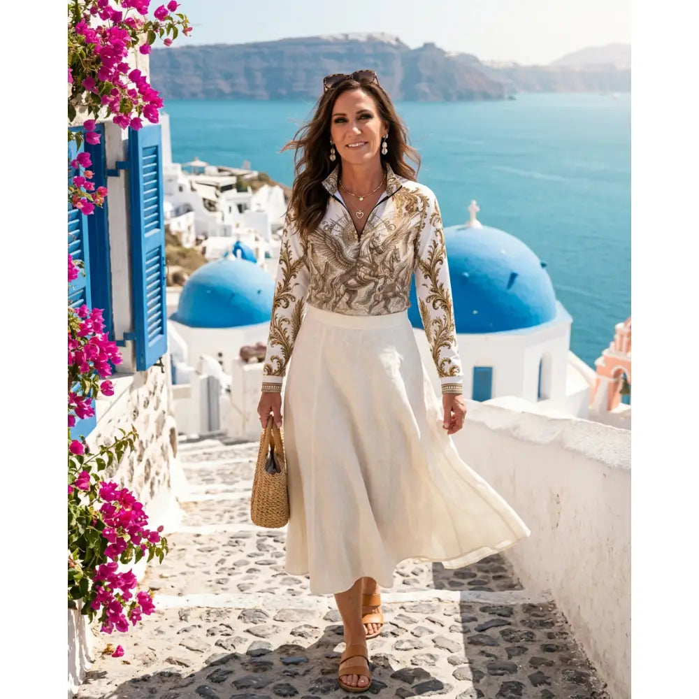 Woman wearing solis aeternum ripley signature collection wearable art gold and cream embroidered equestrian sun shirt