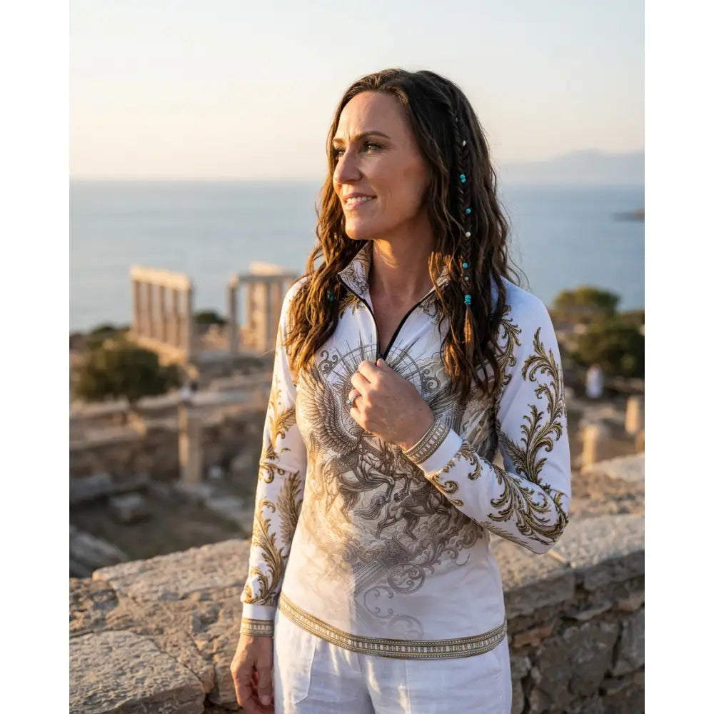 White long-sleeved zip-up solis aeternum sun shirt with gold and gray ornate phoenix design from ripley signature collection wearable art