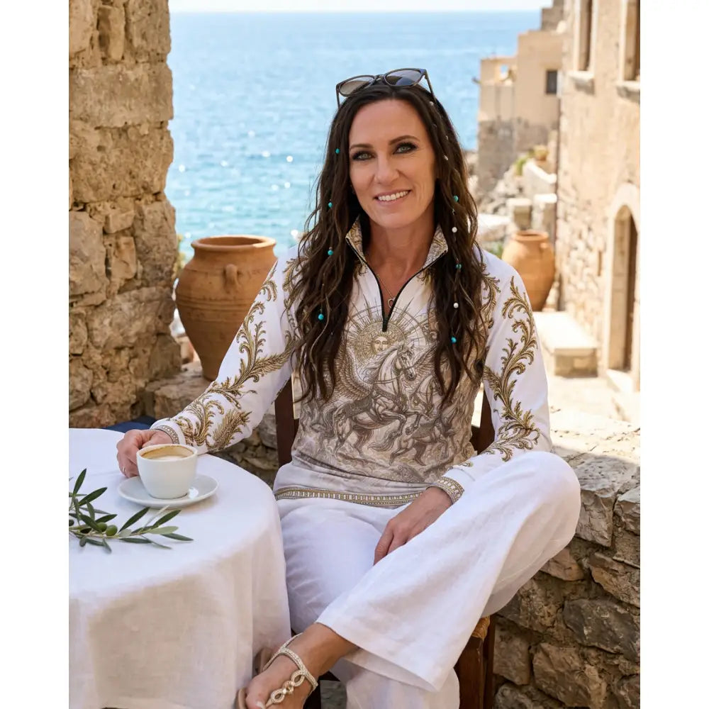 White embroidered long sleeve solis aeternum sun shirt with gold horse print from ripley signature collection wearable art