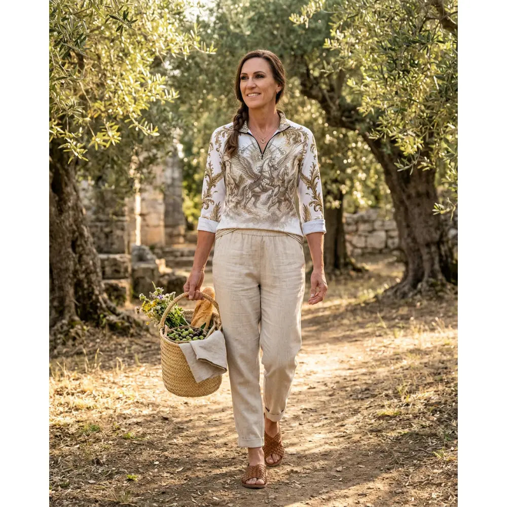 Woven wicker basket with olive branches and green olives lined with beige cloth in solis aeternum wearable art sun shirt image