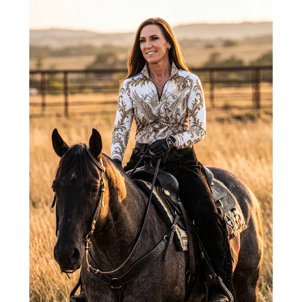 White long-sleeved performance equestrian sun shirt with gold and black ornate eagle design upf50+ solis aeternum