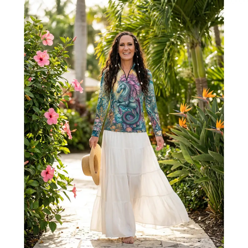 Tidewoven Reefborn long-sleeved UPF50+ equestrian sun shirt with teal and purple dragon wearable art inspired by reef ecosystems
