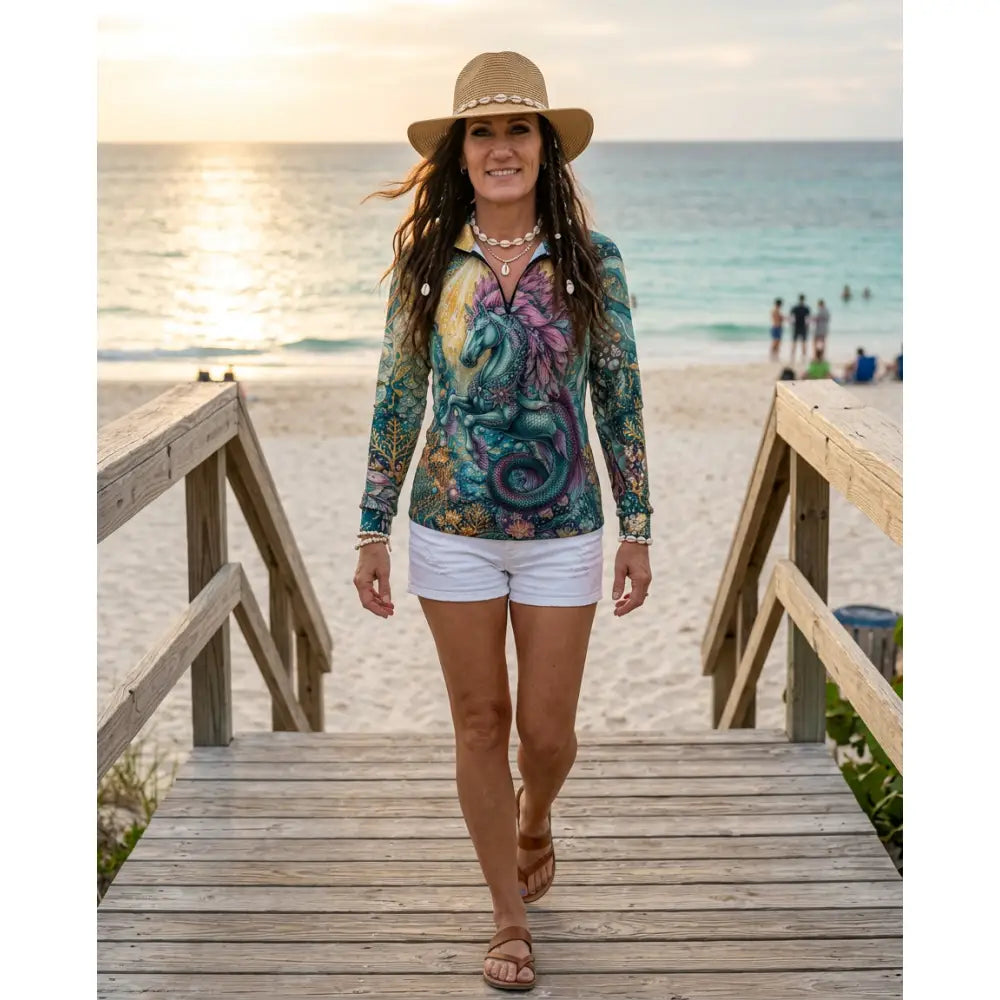 Vibrant teal and purple long-sleeved tidewoven reefborn sun shirt with colorful dragon and floral design wearable art