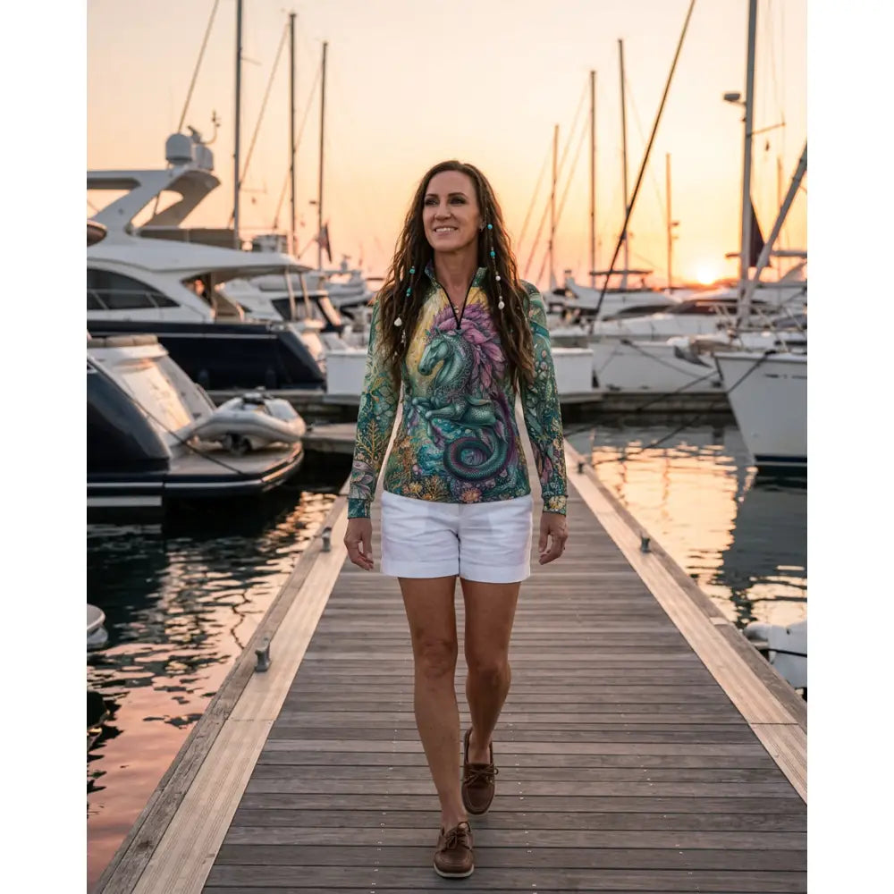 Tidewoven Reefborn long-sleeved equestrian sun shirt with teal purple sea creature design and UPF50+ performance apparel