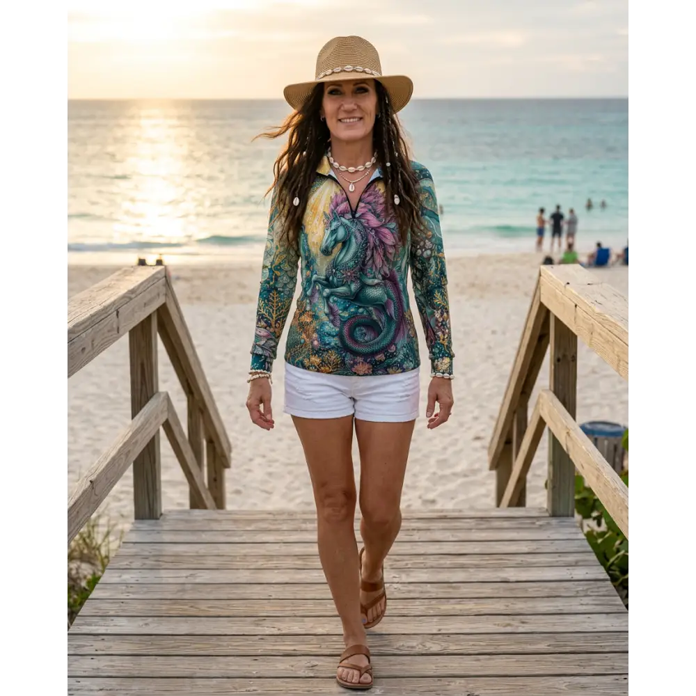 Vibrant long-sleeved tidewoven reefborn performance equestrian sun shirt with teal and purple dragon design and floral accents
