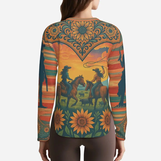 Western-themed long-sleeved shirt with cowgirls, sunflowers, and sunset sky design